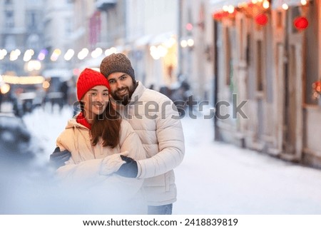 Lovely couple spending time together on city street