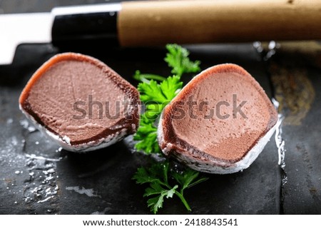 Delicious Chocolate Mochi Ice Cream Close-Up - 4K Ultra HD Image of Irresistible Frozen Treat