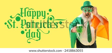 Funny bearded man in leprechaun's hat, with beer and flag of Ireland on yellow background. Banner for St. Patrick's Day