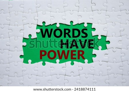 Words have power symbol. Concept words Words have power on white puzzle. Beautiful green background. Business and Words have power concept. Copy space.