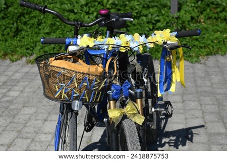 Before the bicycle race, the bicycles is decorated with flowers and tapes in the colors of the national flag of Ukraine.