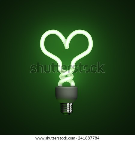 Energy saving compact fluorescent lightbulb, lamp on a green background with fine illumination