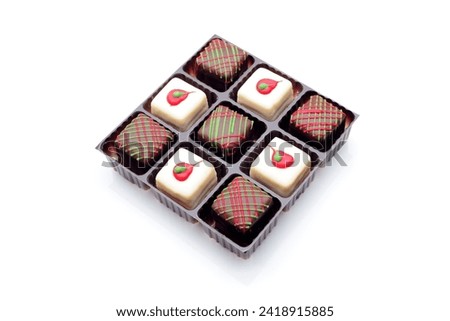 Close-Up of Chocolate Candy on White Background - 4K Ultra HD Image of Sweet Temptation