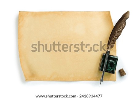Old paper sheet with quill pen and ink bottle isolated on white background Royalty-Free Stock Photo #2418934477