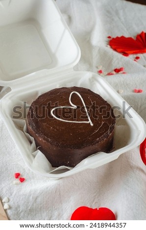 Korean style shocolate bento cake on light background.  Cake for Valentine's Day, Mother's Day, or Birthday, Love Forever Message, Romantic Bento Cake for Two