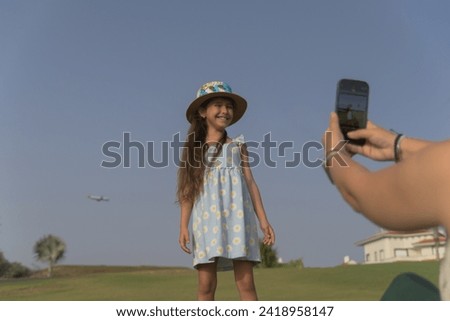 photo session of a mother with her daughter while flying an airplane