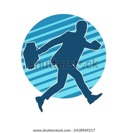 Silhouette of a business man carrying a briefcase