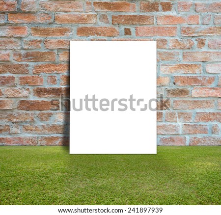 Blank white poster with brick wall and green lawn for information message