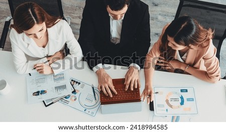 Businessman is in meeting discussion with colleague businesswomen in modern workplace office. People corporate business team concept. uds Royalty-Free Stock Photo #2418984585