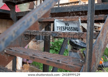 No Trespassing Sign On Metal Stairs