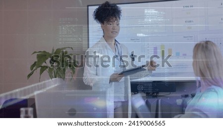 Image of data processing over biracial female doctor in office. Global finance, business, connections, computing and data processing concept digitally generated image.