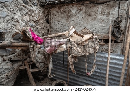 Pictures from Balti Heritage home and Museum, display the village home, century-old  horse saddle, and vibrant clothing for the cattle. The old mud house was constructed 140 years ago.