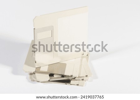 Floppy disk or diskette, magnetic storage medium for personal computer.