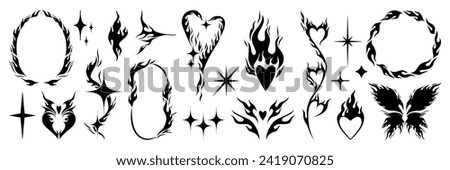 Set of y2k flame elements, star, fire and heart shape. Tattoo art hand drawn stickers. Aesthetic of 90s, 2000s. Vector isolated illustration. Royalty-Free Stock Photo #2419070825