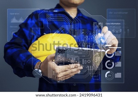 Facility management concept with engineer using tablet to monitoring single line diagram of building or factory to manage devices operation records data and scheduling for maintenance plan Royalty-Free Stock Photo #2419096431