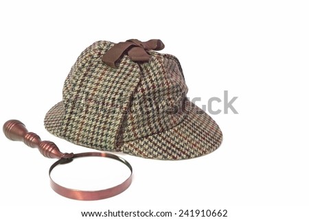 Sherlock Holmes Hat or  Deerstalker Hat and Retro Magnifying Glass Isolated on White Royalty-Free Stock Photo #241910662