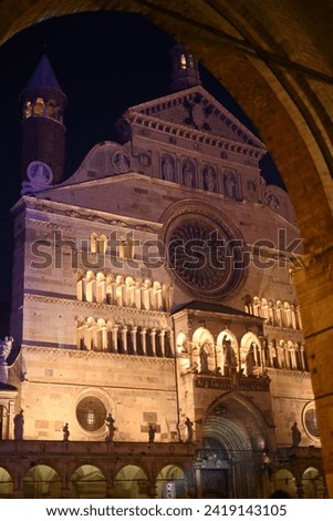 Cremona Santa Maria Assunta Cathedral in Piazza Duomo by night in winter time high res image