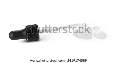 Drop falls from a pipette into a cosmetic bottle,isolated on white background