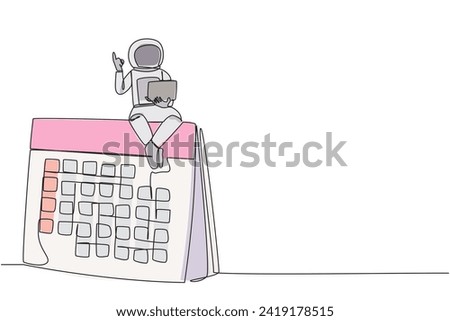 Continuous one line drawing young energetic astronaut sitting on giant deck calendar holding laptop raise one hand. Return date at the weekend, speed up the expedition. Single line draw design vector