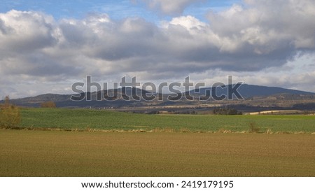 Mountainous landscape. Countryside landscape, rural, fields hills panoramic landscape. Spring on the country.