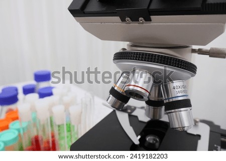 Modern medical laboratory with microscope and test tubes and biochemistry on rooftop biotechnology development center. Science laboratory of high-tech equipment microscope