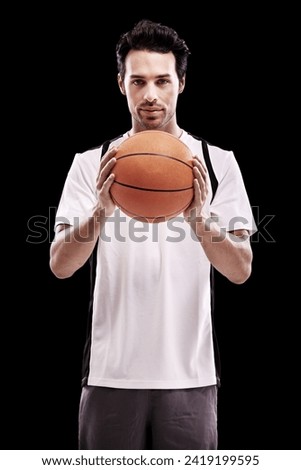 Basketball, portrait and fitness man with ball in studio for training, wellness or exercise challenge on black background. Workout, face and male athlete with handball, catch or performance match