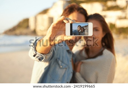 Couple, selfie and smile for phone screen by ocean for memory on vacation with care, love and tropical beach. Man, woman and hug with photography, profile picture or mobile app by sea on social media