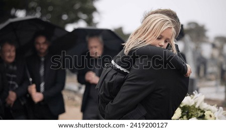 Sad, hug and a father and child at a funeral with depression and mourning at the graveyard. Holding, young and a dad with care and love for a girl kid at a cemetery burial and grieving together Royalty-Free Stock Photo #2419200127