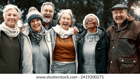 Happy, portrait and senior friends in a park while walking outdoor for fresh air together. Diversity, smile and group of elderly people in retirement taking picture and bonding in a forest in winter.