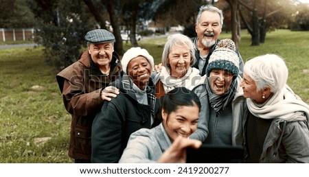 Nature, selfie and senior friends with woman while walking in outdoor garden for fresh air. Diversity, happy and group of elderly people in retirement taking picture with young female person in park.