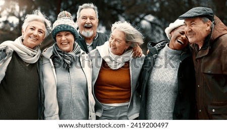 Happy, portrait and senior friends in a park while walking outdoor for fresh air together. Diversity, smile and group of elderly people in retirement taking picture and bonding in a forest in winter.