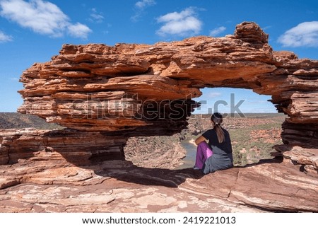 Tourists enjoy Nature's Window, Kalbarri National Park, Western Australia. Royalty-Free Stock Photo #2419221013