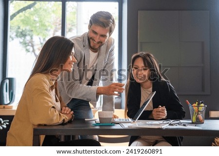 Businessteam working together on project Royalty-Free Stock Photo #2419260891