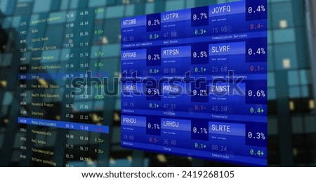 Image of financial data processing over screens. Global networks, business, finances, computing and data processing concept digitally generated image.