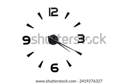 Black wall clock on a white background at twenty past four. Time is 04:20 or 16:20 Royalty-Free Stock Photo #2419276327