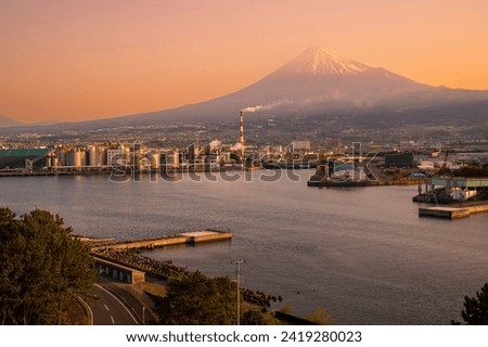 Japan industrial factory area with Fuji mountain and sun rise or sunset sky background view from Fishing port, Fujinomiya City, Shizuoka, Japan	 Royalty-Free Stock Photo #2419280023