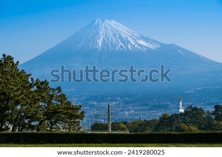 Fuji mountain and blue sky background view from Fishing port, Fujinomiya City, Shizuoka, Japan Royalty-Free Stock Photo #2419280025