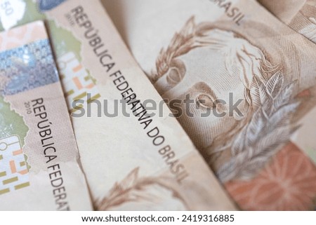 Brazilian Real Banknotes in close-up photo. Brazilian economy.
