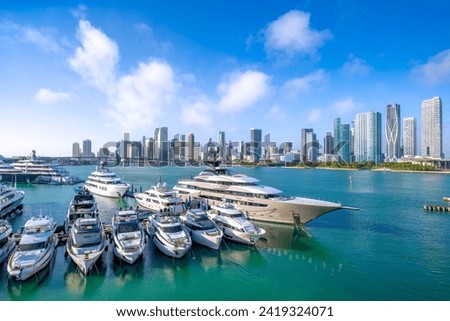 the skyline of miami with a marina Royalty-Free Stock Photo #2419324071
