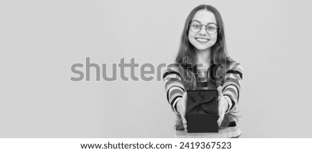 present and gifts buy. shopping child with purchase. kid with box. happy birthday holiday. Kid girl with gift, horizontal poster. Banner header with copy space.