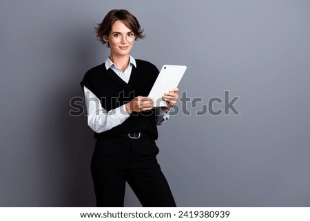 Photo of gorgeous confident lady wear stylish outfit presenting vacancy office position empty space isolated on gray color background
