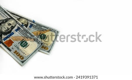  Flat lay. Dollars. $100 bills. 200$  Banknotes. American money. Bucks. Horizontal white background with izolated dollar bills. Inflation, exchange.
