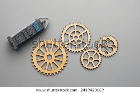 Flatlay picture of wooden gear with vesselt. Technical and mechanical concept