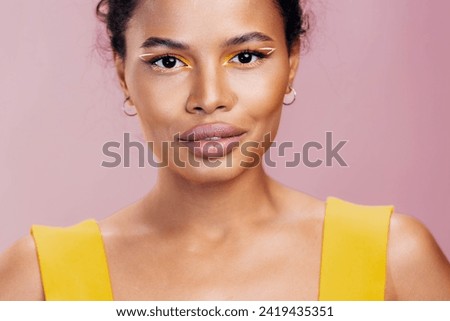 Beauty woman smile beautiful cosmetic style face black creative make-up yellow colourful african portrait Royalty-Free Stock Photo #2419435351