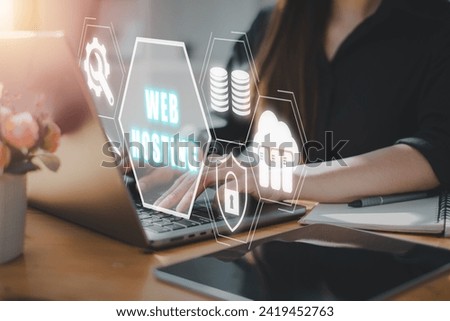 Web hosting concept, Business woman using laptop computer on office desk with web hosting icon on virtual screen. Email Hosting, Website, Server, Database, Domain Name System, Configuration, Storage.