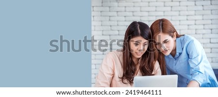 Banner Happy success business woman partner meeting working together in company office. Panoramic picture of Meeting Executive Asian business woman office desk with fist arm raised executive teamwork