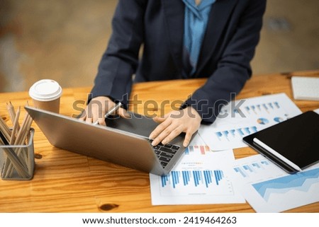 Businesswoman talking to customers online together at the office.