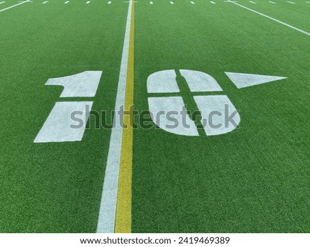 Close-up of the ten-yard line on the astro-turf playing field at Denny Farrell Riverbank State Park in New York City