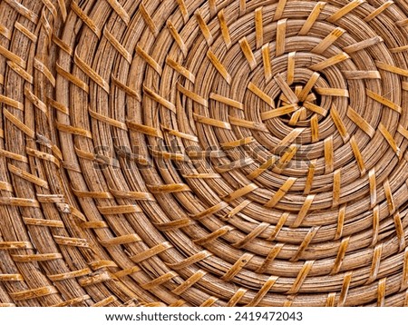 Detailed circular patterns on a woven placemat