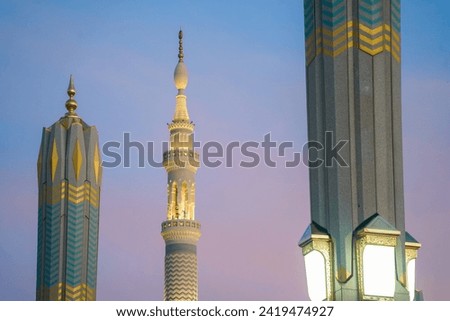 Mosque tower with blue sky background
